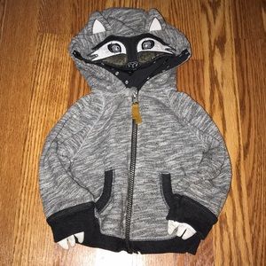 Light jacket with raccoon hood